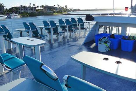 a blue boat sitting on top of a table