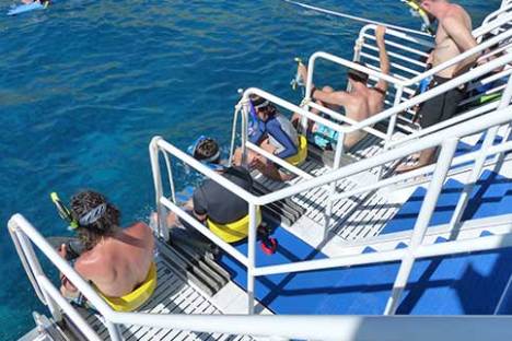 A large dive step for easy entry on Snorkel charter boat trip on Maui from Lahaina