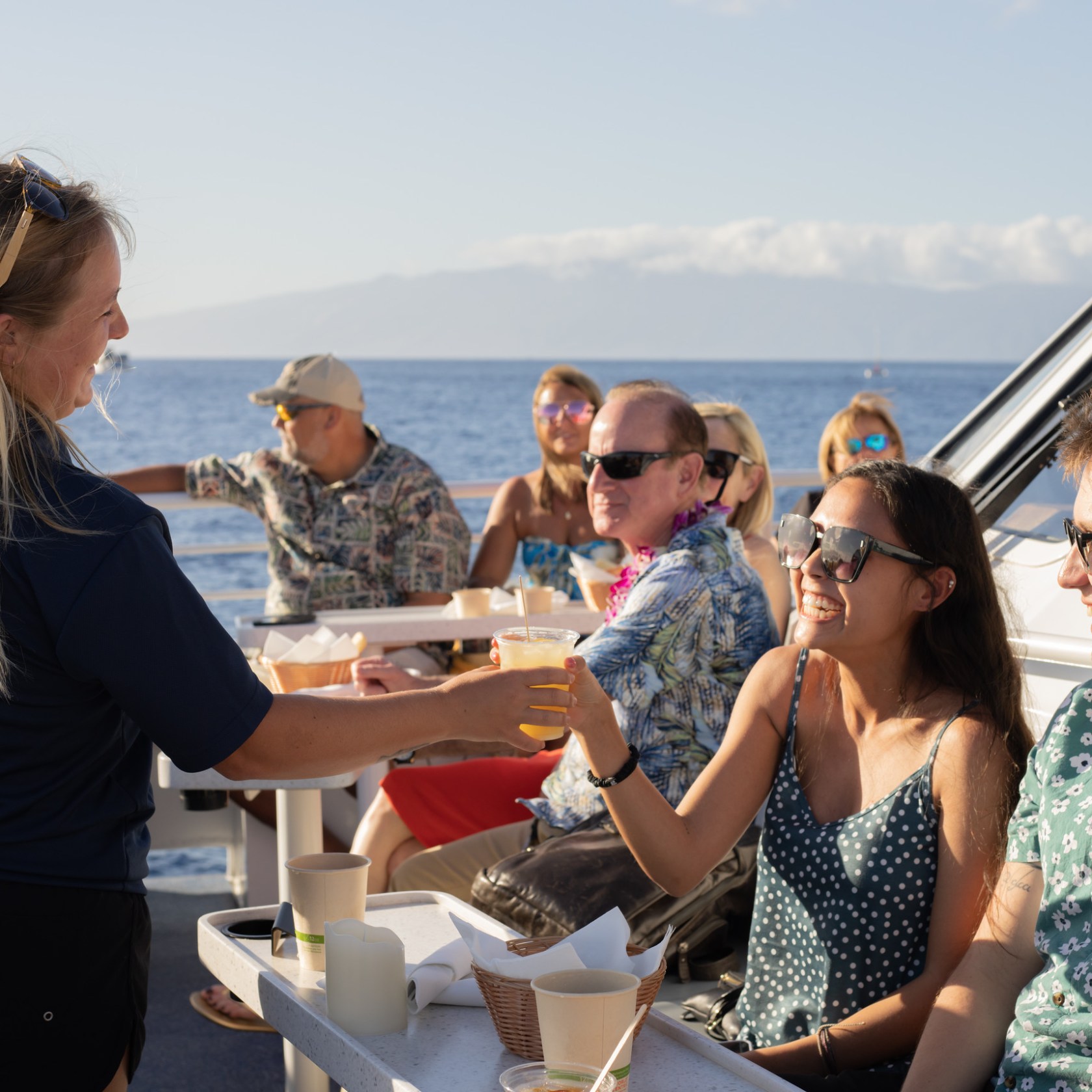 a group of people on a boat in the water