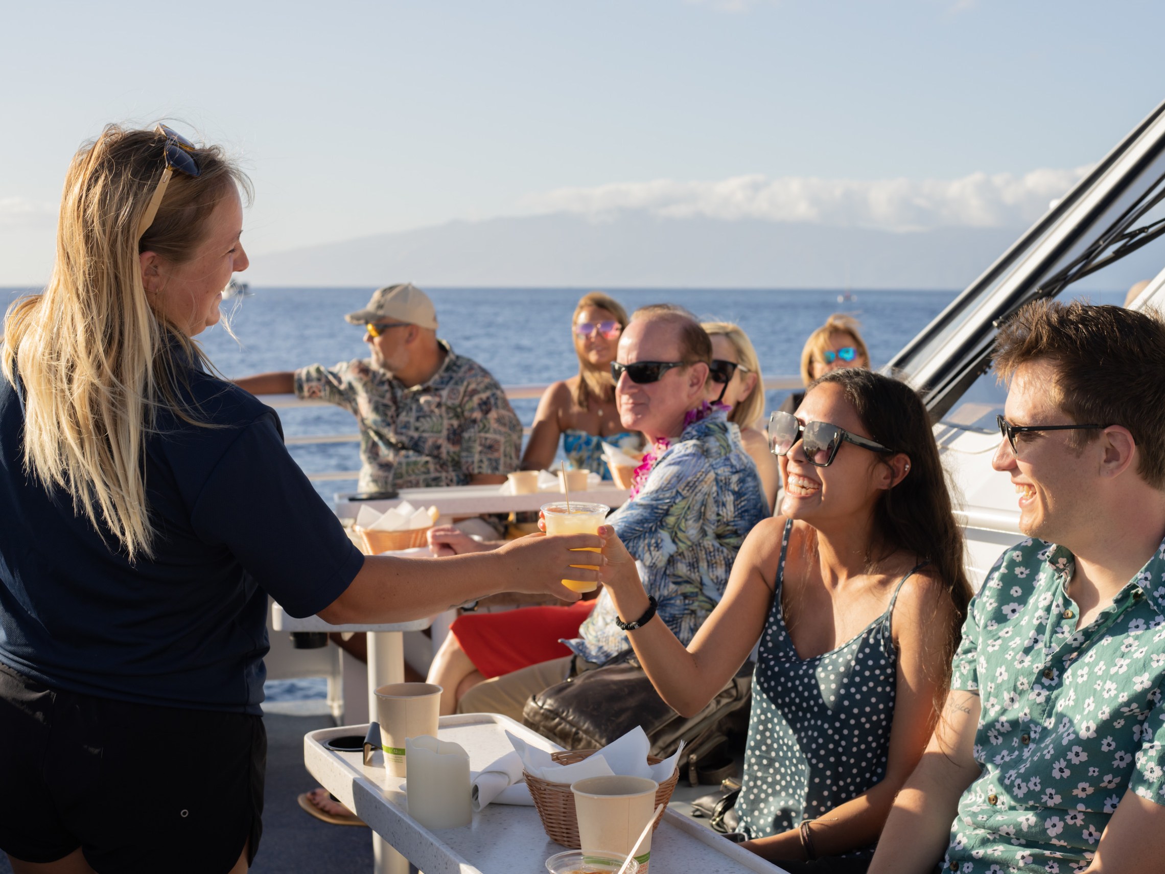 a group of people on a boat in the water