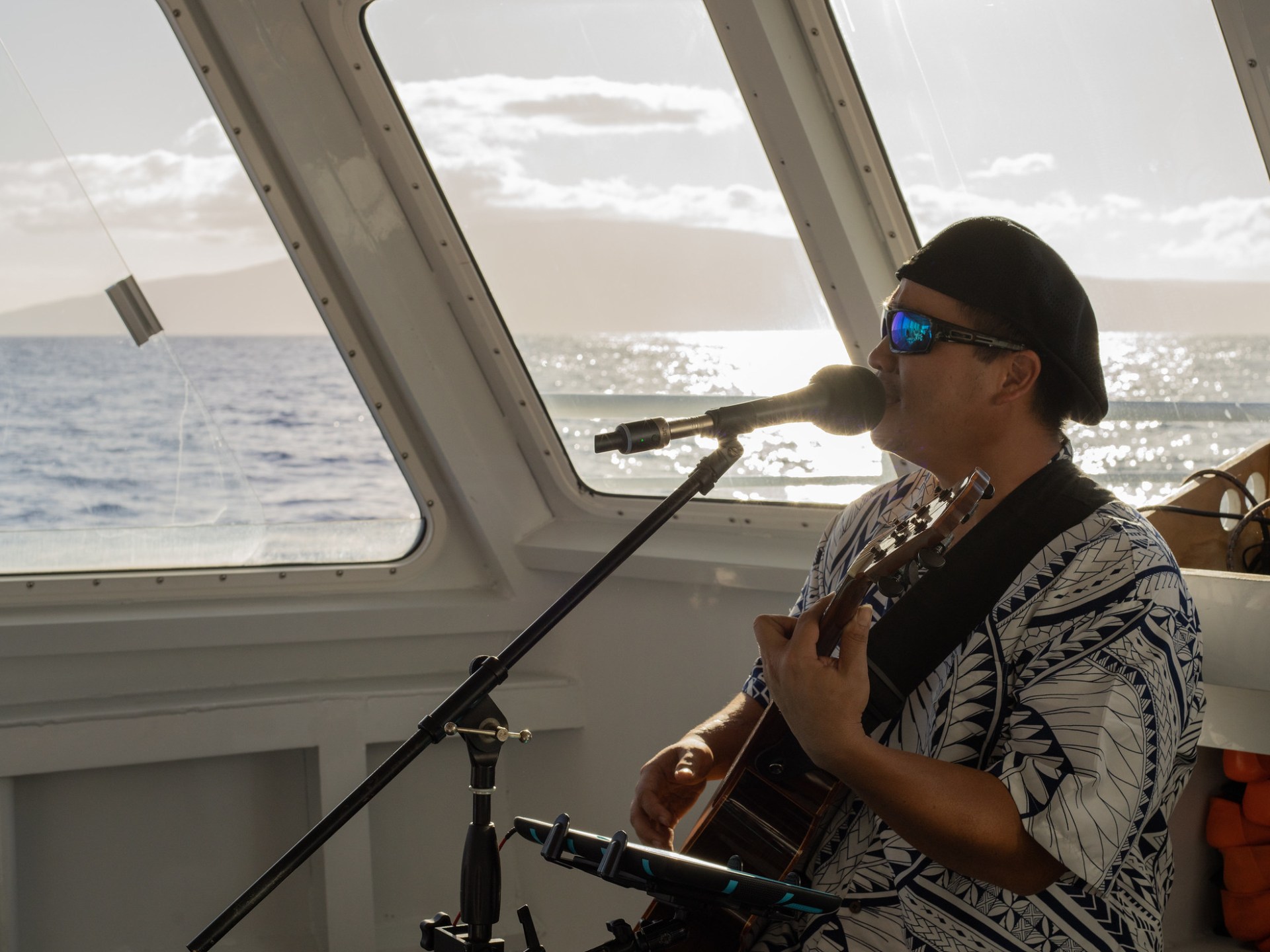 a woman standing in front of a boat
