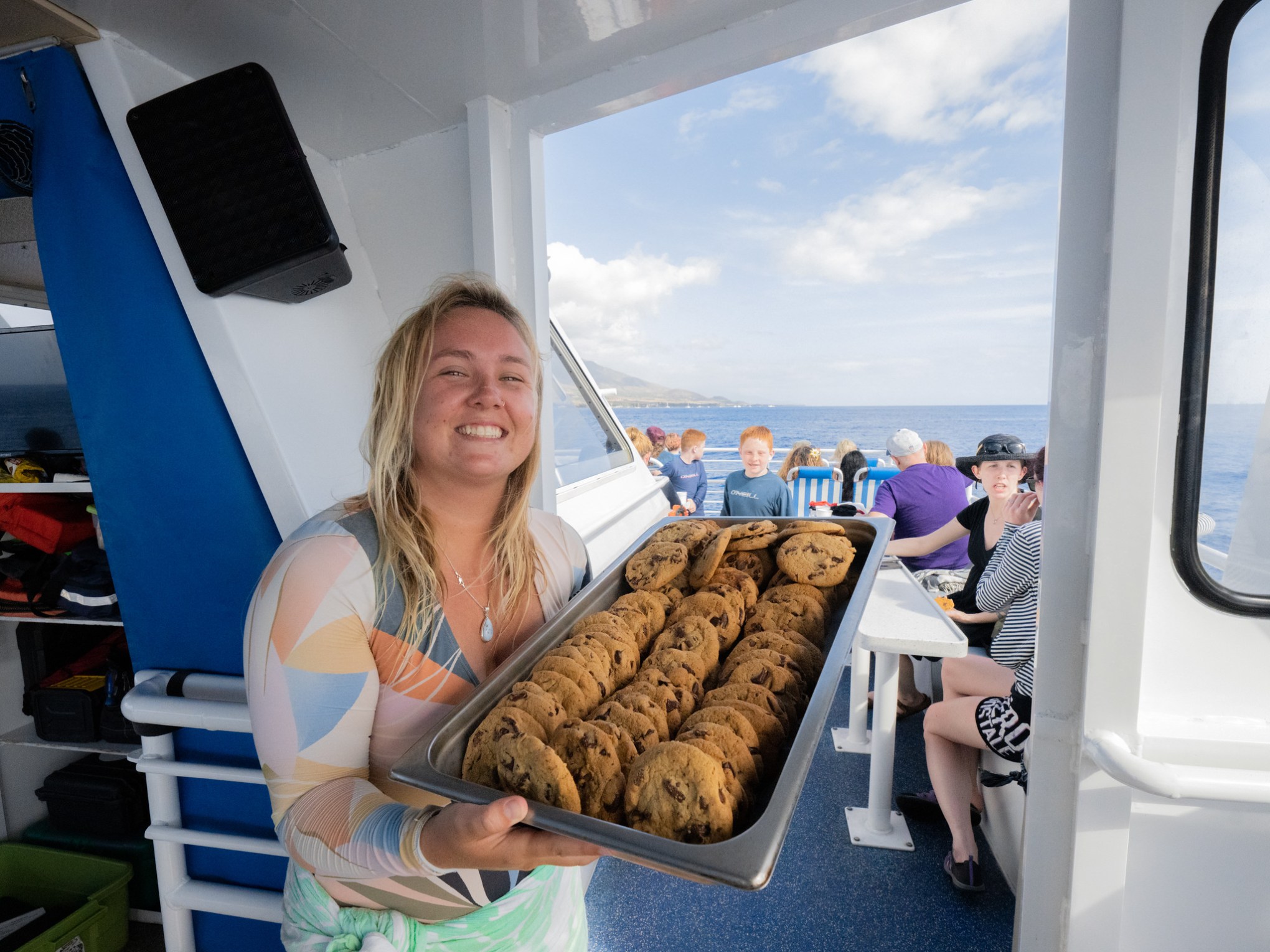a person holding a tray of food