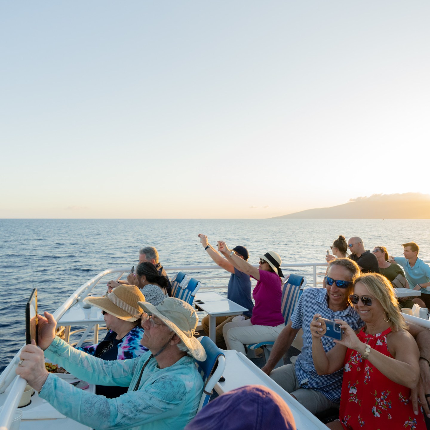 a group of people in a boat on a body of water