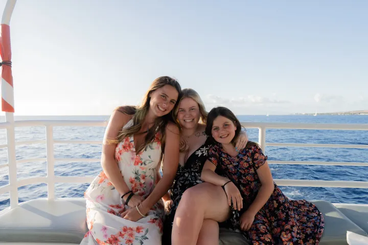 a woman sitting at a beach
