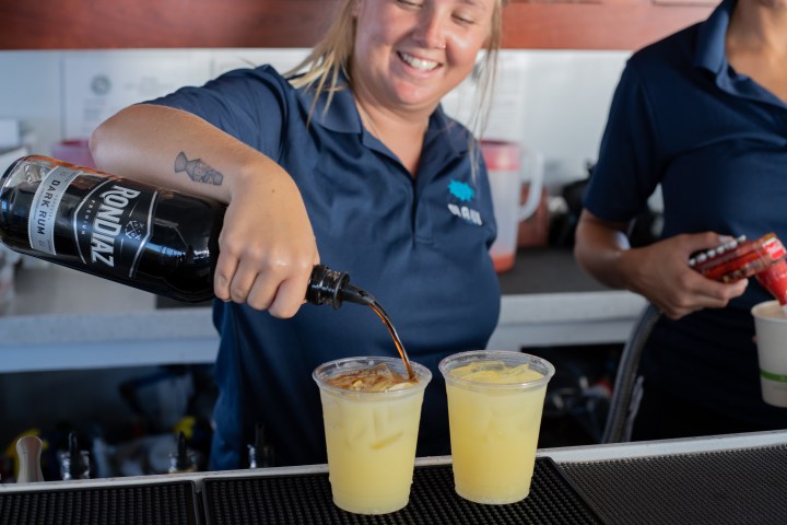 a person holding a cup of coffee