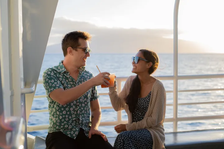 a person drinking a glass of water